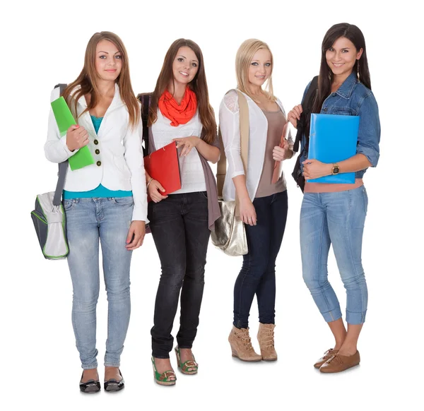 Fyra kvinnliga studenter — Stockfoto
