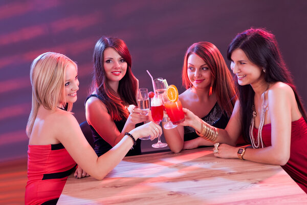 Female friends enjoying a cocktail