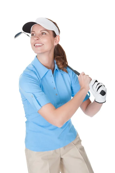 Golfista con un palo de golf — Stockfoto