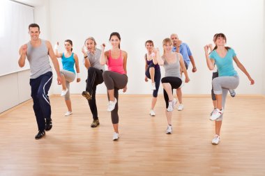 Group of doing aerobics exercises