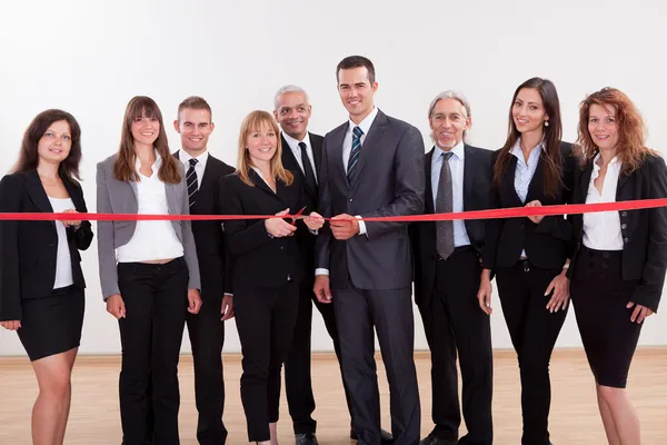 Management about to cut the red ribbon — Stock Photo, Image