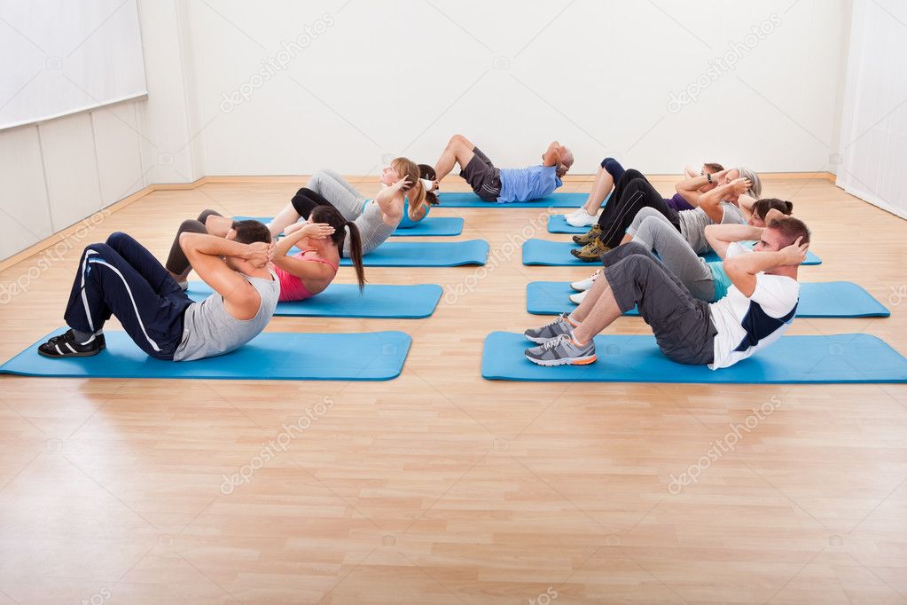 Group of working out in a gym