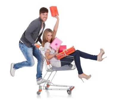 Woman carried by push cart