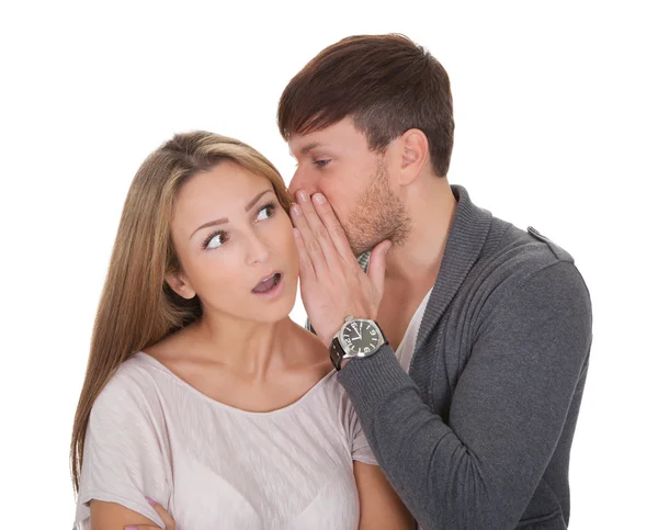 Loving guy whispered something — Stock Photo, Image