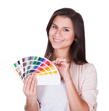 Attractive woman chooses a color scheme clipart