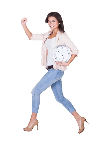 Mujer sexy con un reloj — Stockfoto