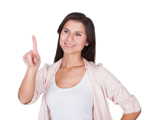 Beautiful Caucasian young woman pointing Stock Image