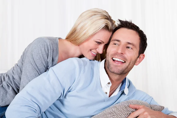 Happy man and woman cuddling — Stock Photo, Image