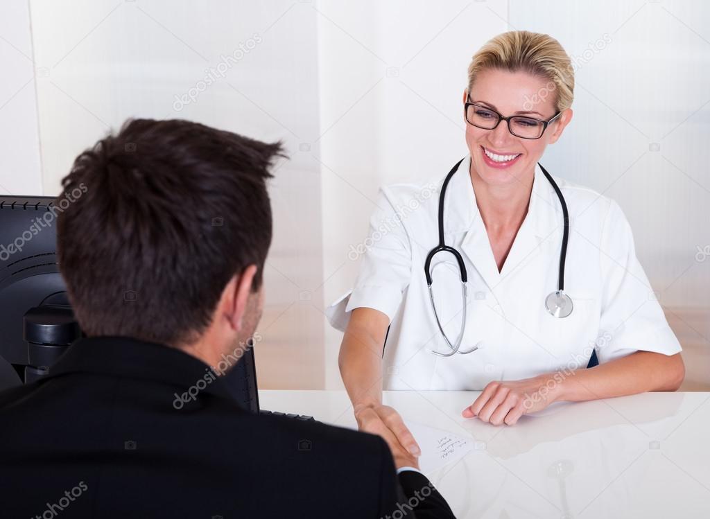 Female doctor consulting with a patient