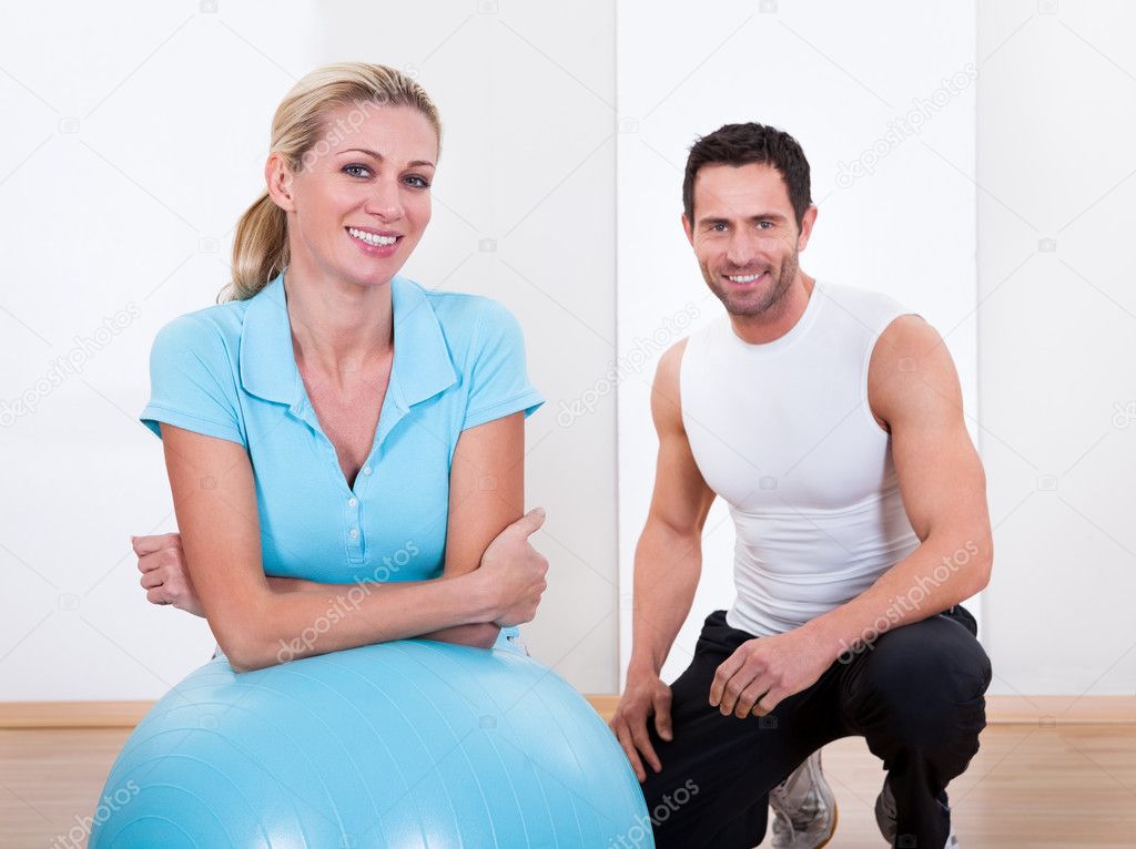 Fitness instructor and woman
