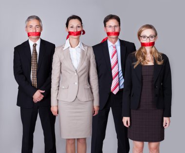Businesspeople bound by red tape clipart