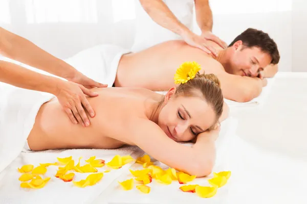 Attractive couple having a massage — Stock Photo, Image