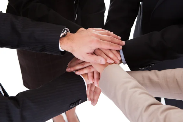 Businesspeople holding hands - teamwork — Stock Photo, Image