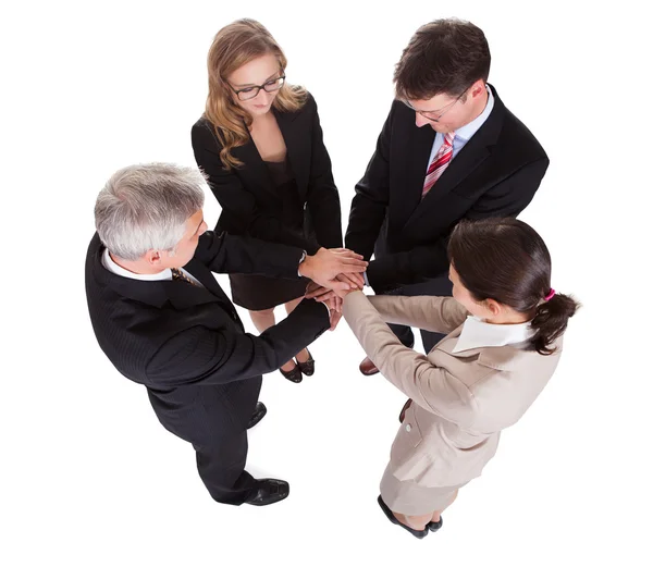 Businesspeople holding hands - teamwork Royalty Free Stock Photos