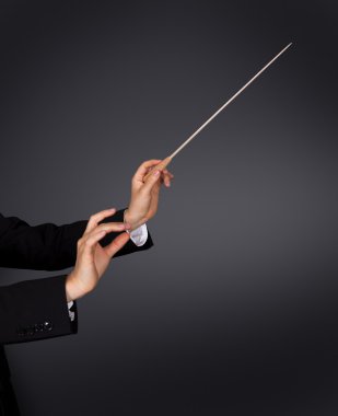 Music conductor with a baton clipart