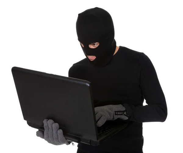 Burglar on Computer — Stock Photo, Image