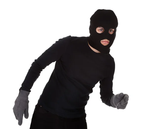 Ladrão usando uma balaclava — Fotografia de Stock