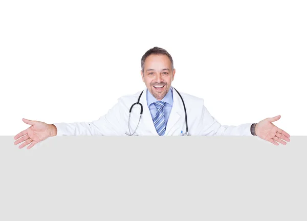 Portrait Of A Doctor Holding Blank Placard — Stock Photo, Image