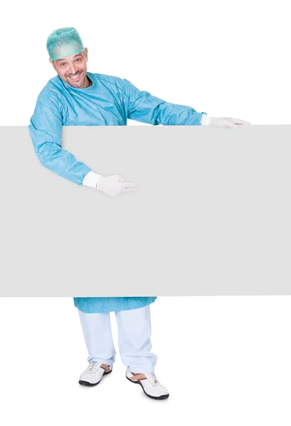 Médico en la operación vestido de retención en blanco Placard — Foto de Stock