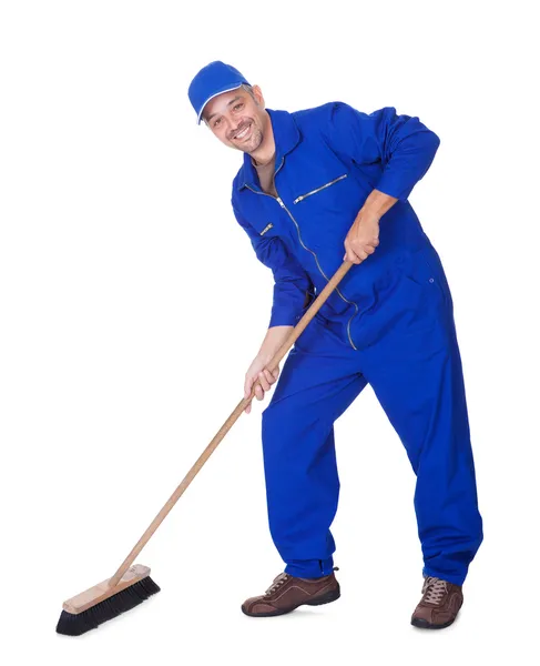 Happy Sweeper Cleaning Floor — Stock Photo, Image