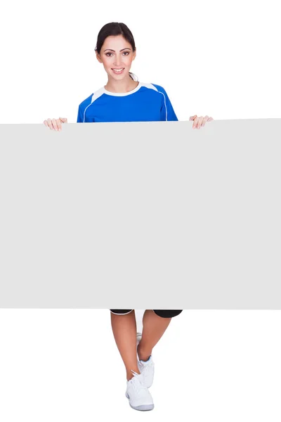 Sporty Woman Holding Blank Placard — Stock Photo, Image