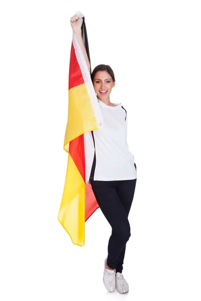 Atractiva mujer muestra bandera de Alemania — Foto de Stock