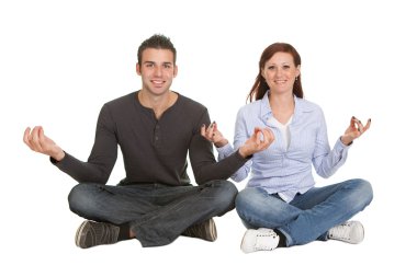 Yoga pozisyonda oturan Çift