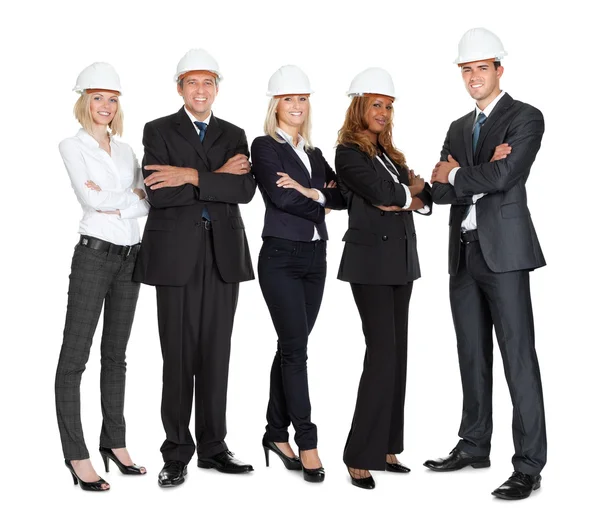 Team van succesvolle bouwvakkers op wit — Stockfoto