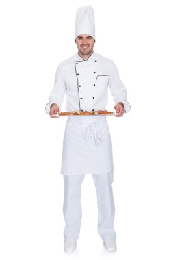 tepsi ile mutlu bakerman portresi