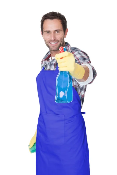 Portrait of a man with sponge and spray — Stock Photo, Image