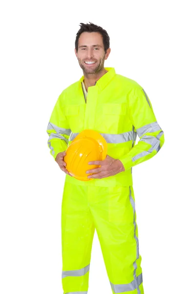 Glada arbetare bär säkerhet jacka — Stockfoto