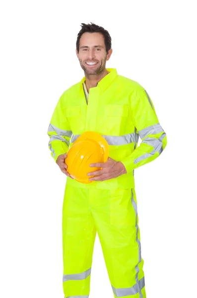 Glücklicher Arbeiter in Sicherheitsjacke — Stockfoto