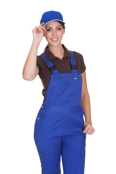 Portrait Of Happy Plumber While Holding Cap — Stock Photo, Image