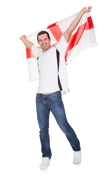 Retrato de un hombre feliz sosteniendo una bandera inglesa —  Fotos de Stock