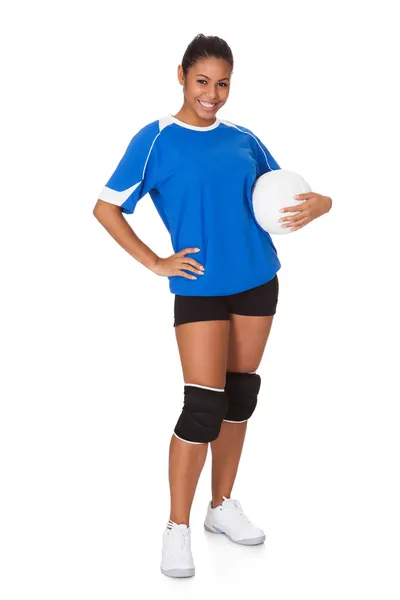 Joven chica sosteniendo voleibol — Foto de Stock