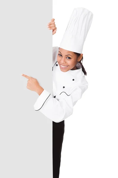 Female Cook Standing Behind The Placard — Stockfoto