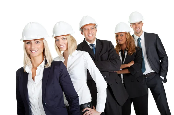 Team av byggnadsarbetare isolerad på vit — Stockfoto