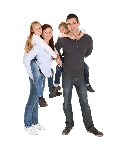 Glückliche junge Familie verbringt Zeit miteinander — Stockfoto