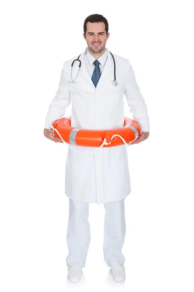 Smiling Male Doctor Holding Rescue Ring — Stock Photo, Image