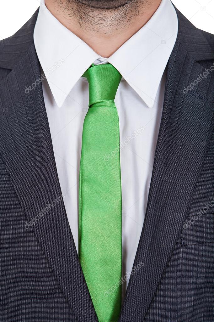 white shirt and green tie