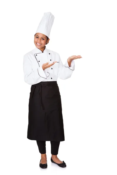 Female Chef Showing Empty Space — Stock Photo, Image