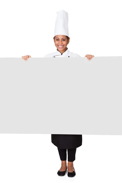 Female Cook Standing Behind The Placard — Stockfoto