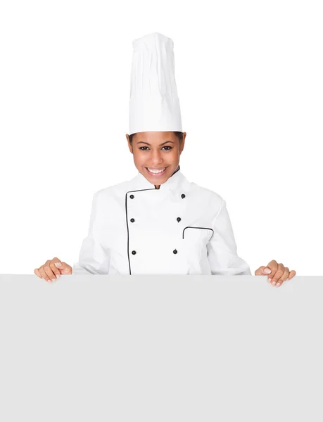 Afişini duran kadın aşçı — Stok fotoğraf