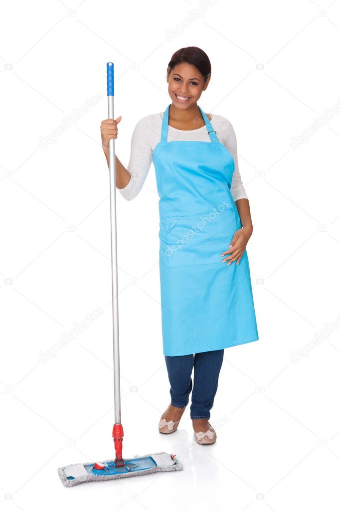 Cheerful Woman Having Fun While Cleaning