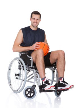 Man in wheelchair playing basketball clipart