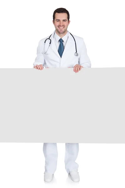 Happy Male Doctor Holding Empty Placard — Stock Photo, Image