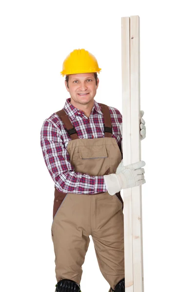 Carpenter with wooden planks — Stock Photo, Image