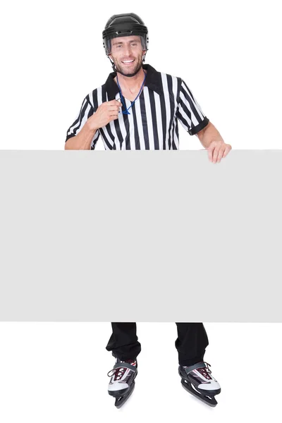 Portrait of hockey judge presenting empty banner — Stock Photo, Image