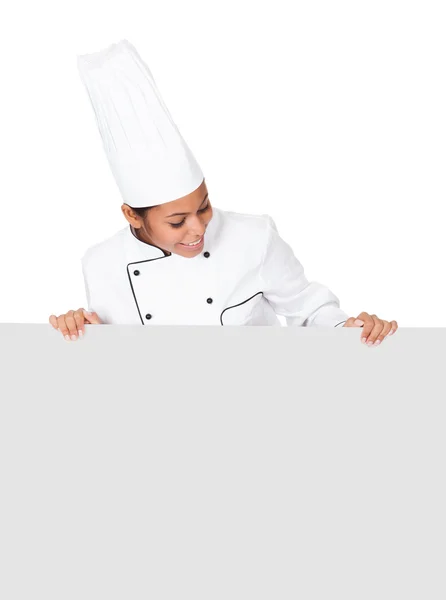 Female Cook Standing Behind The Placard — Stockfoto