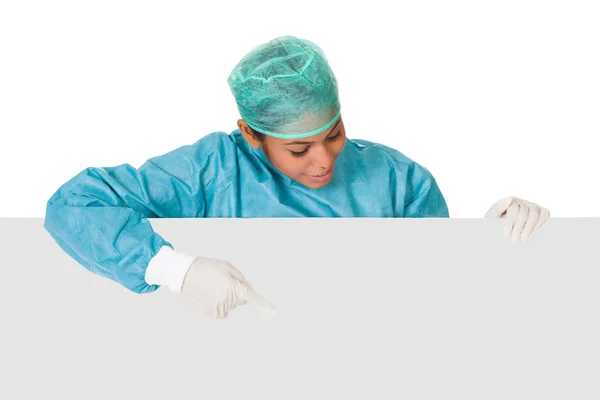 Happy Female Surgeon Holding Placard — Stock Photo, Image